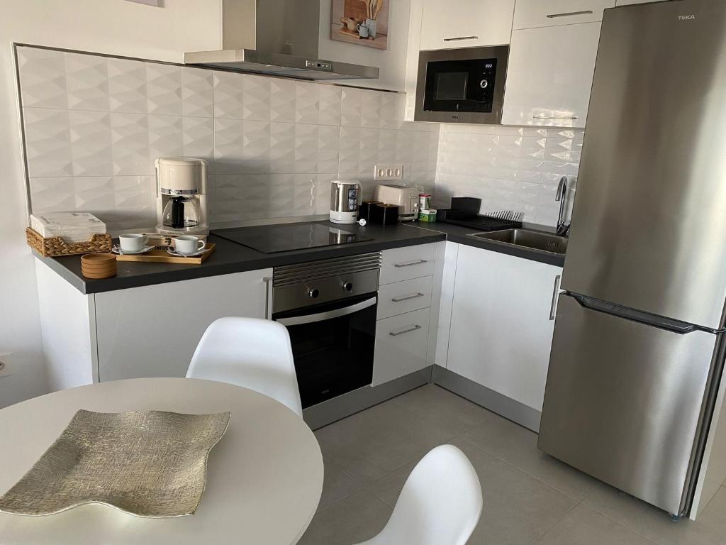 Kuchyň nebo kuchyňský kout v ubytování White Suite Deluxe