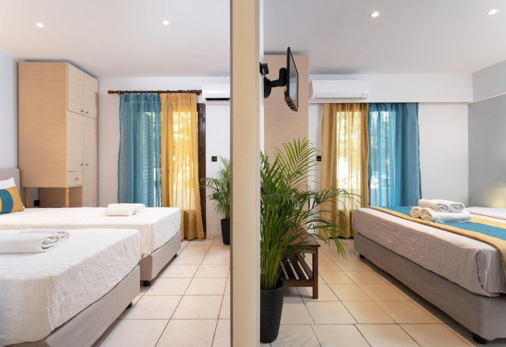 Postel nebo postele na pokoji v ubytování Monemvasia Green Apartments