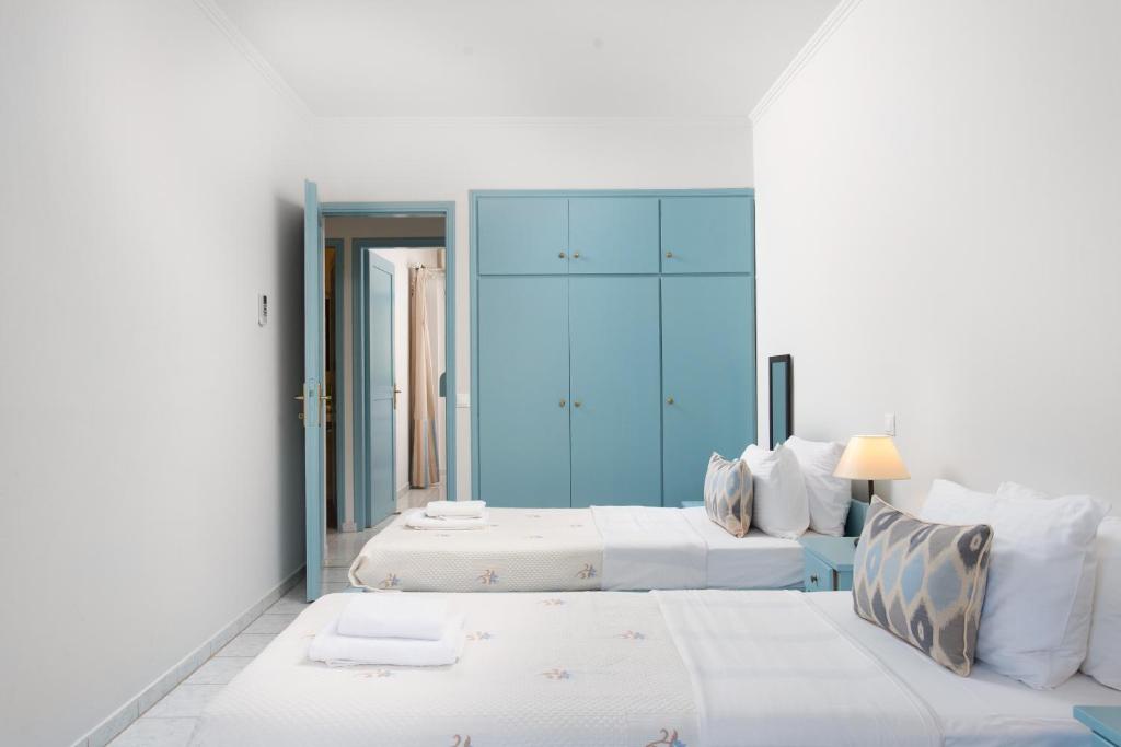 Postel nebo postele na pokoji v ubytování Monemvasia Green Apartments