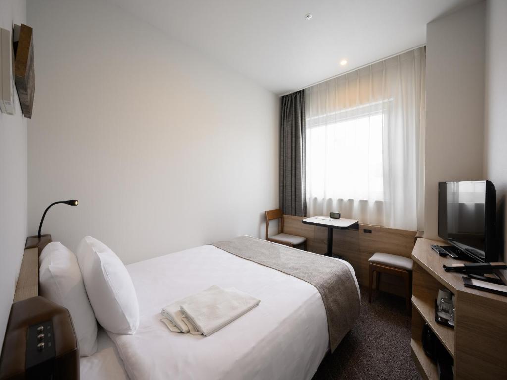 TV a/nebo společenská místnost v ubytování Nagano Tokyu REI Hotel
