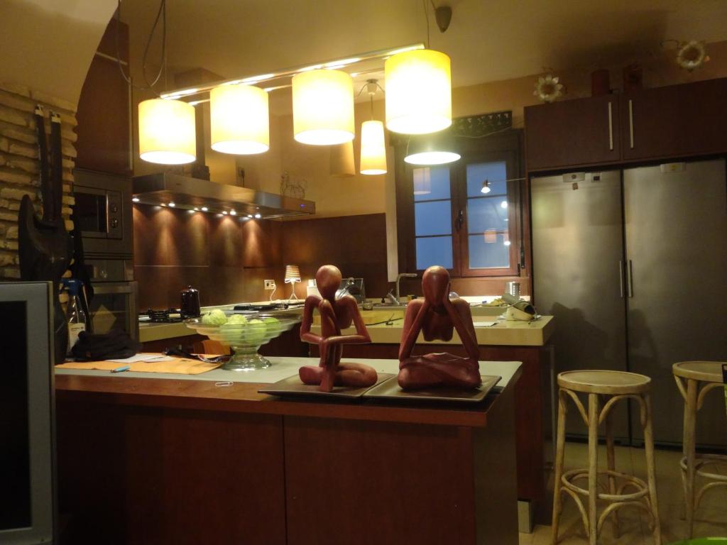 Kuchyň nebo kuchyňský kout v ubytování habitacion en casa kenya