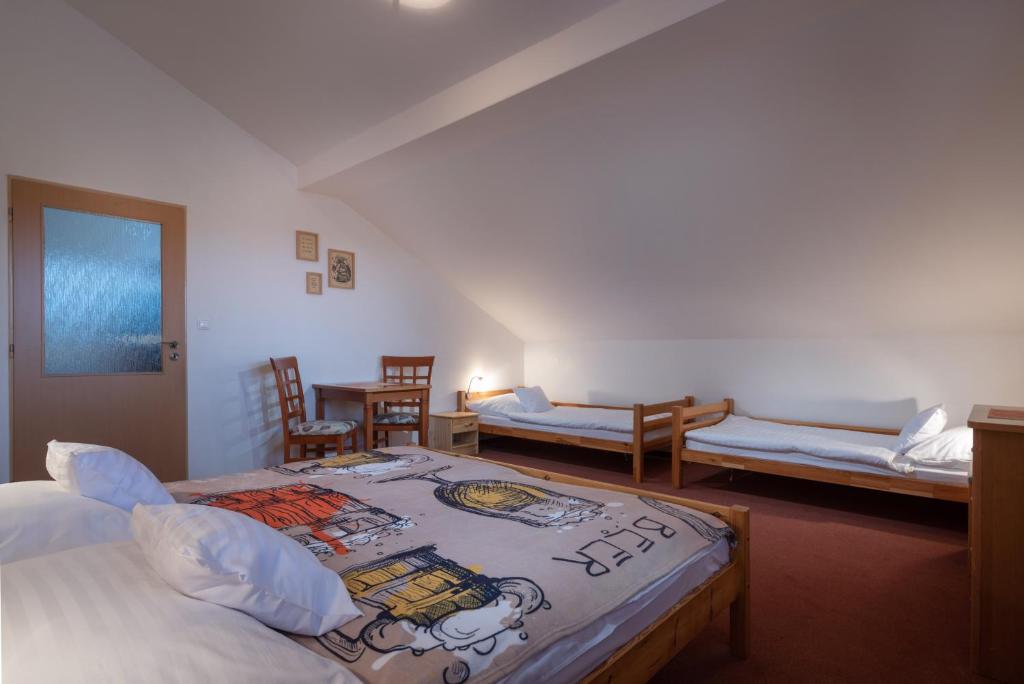 Postel nebo postele na pokoji v ubytování Maravar - Pivný Wellness Adults Only
