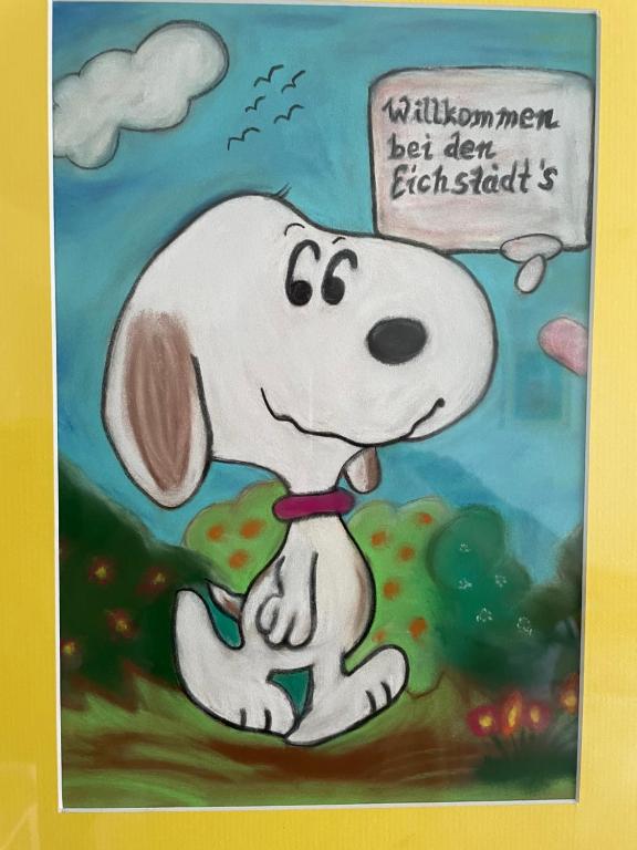 Um desenho animado de um cão com um cartaz que lê crianças. Os homens deixam-na lutar contra o ataque. em Z8 em Jestädt