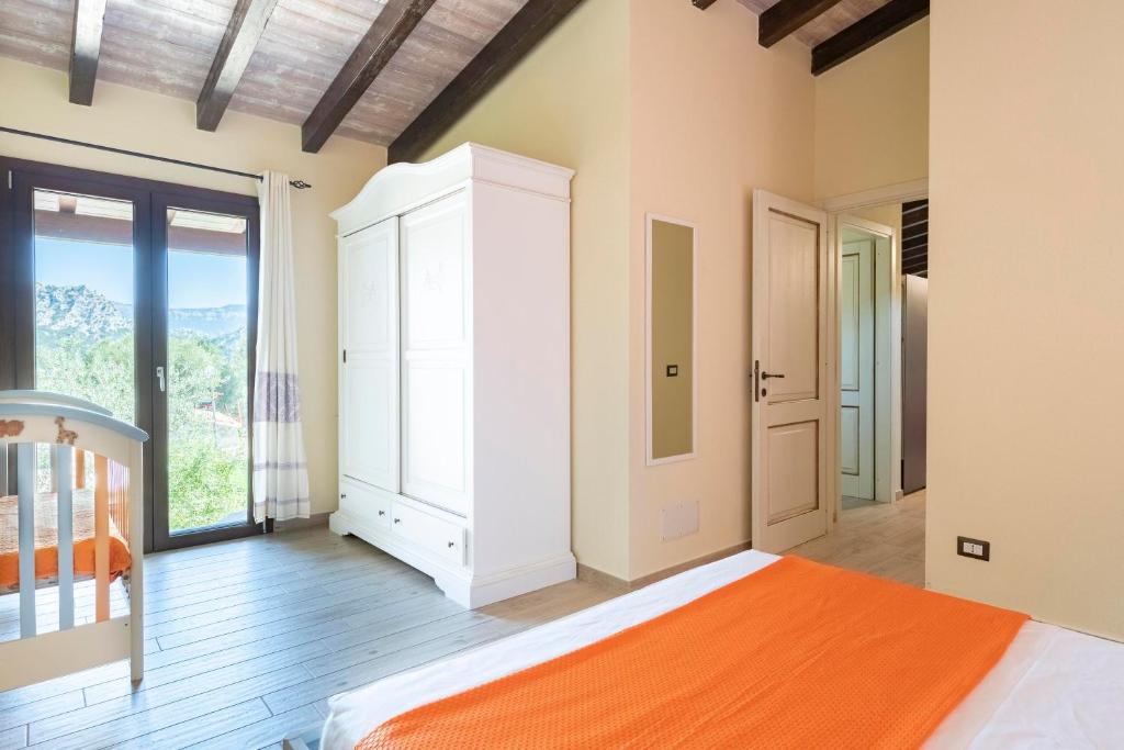 Łóżko lub łóżka w pokoju w obiekcie Casa Sole
