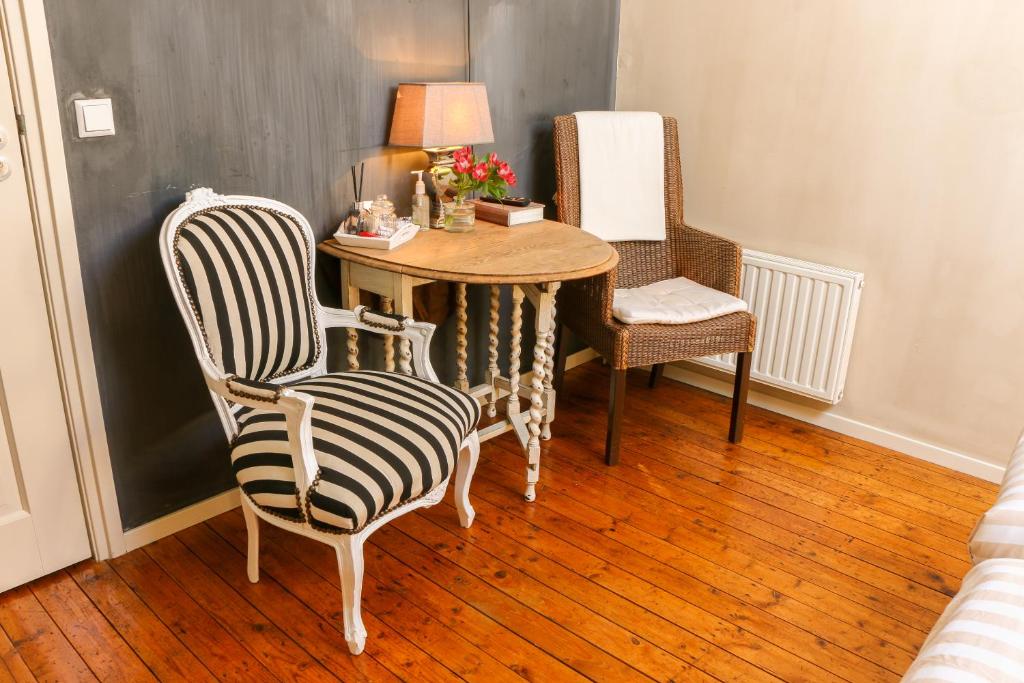 Posezení v ubytování Oostmolenhoeve B&B