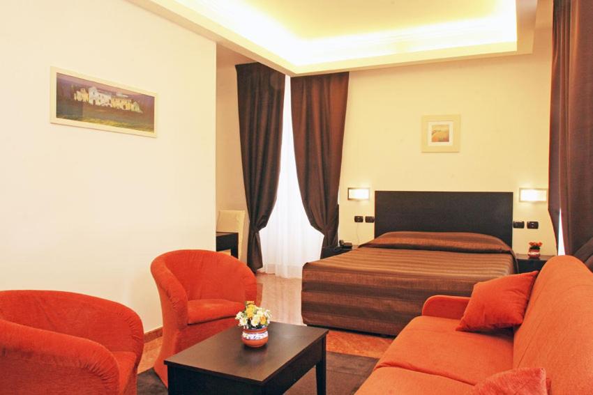 Postel nebo postele na pokoji v ubytování Hotel San Marco