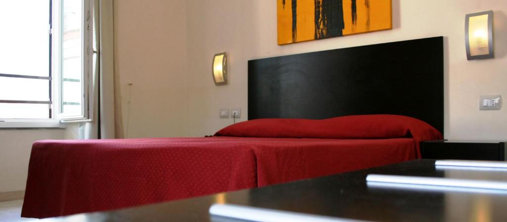 Postel nebo postele na pokoji v ubytování Hotel San Marco
