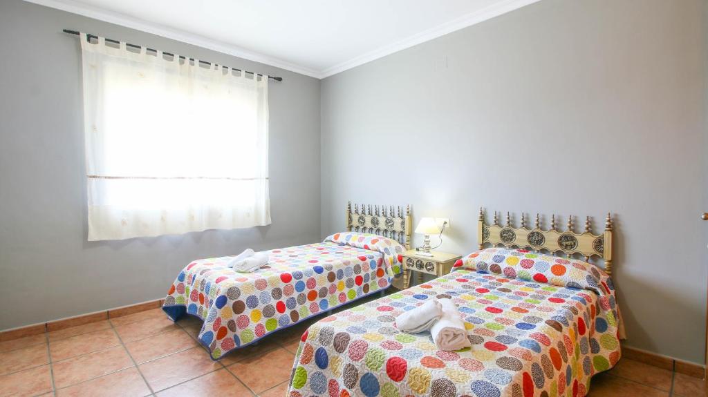 A bed or beds in a room at Finca las Ranas