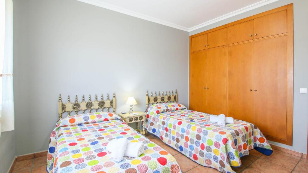 A bed or beds in a room at Finca las Ranas