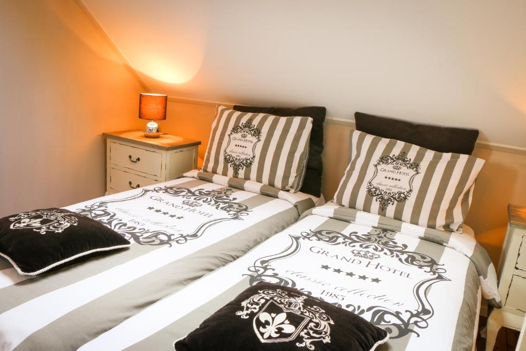 Postel nebo postele na pokoji v ubytování Oostmolenhoeve B&B