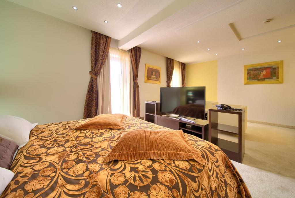 TV a/nebo společenská místnost v ubytování Hotel Marina