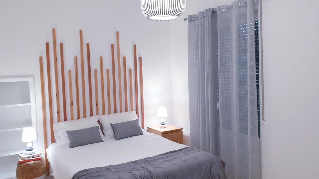 Postel nebo postele na pokoji v ubytování TOPO Apartment