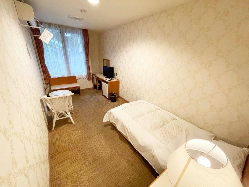 TV a/nebo společenská místnost v ubytování Hotel Ginsui