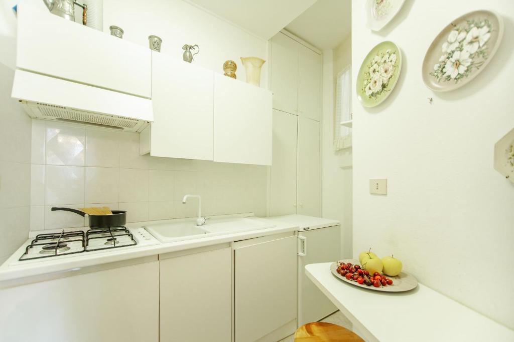 Kuchyňa alebo kuchynka v ubytovaní Imperatrice apartment by Wonderful Italy