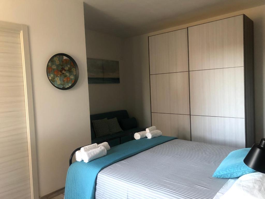 Postel nebo postele na pokoji v ubytování B&B Dimora delle Ninfee