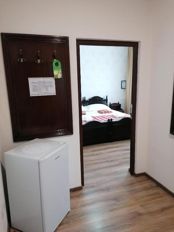 Postel nebo postele na pokoji v ubytování Hanul Hora Romaneasca