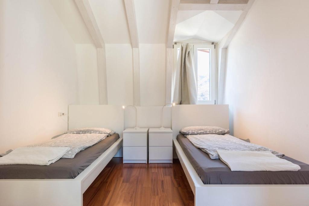 Łóżko lub łóżka w pokoju w obiekcie Appartamento Villa Principessa