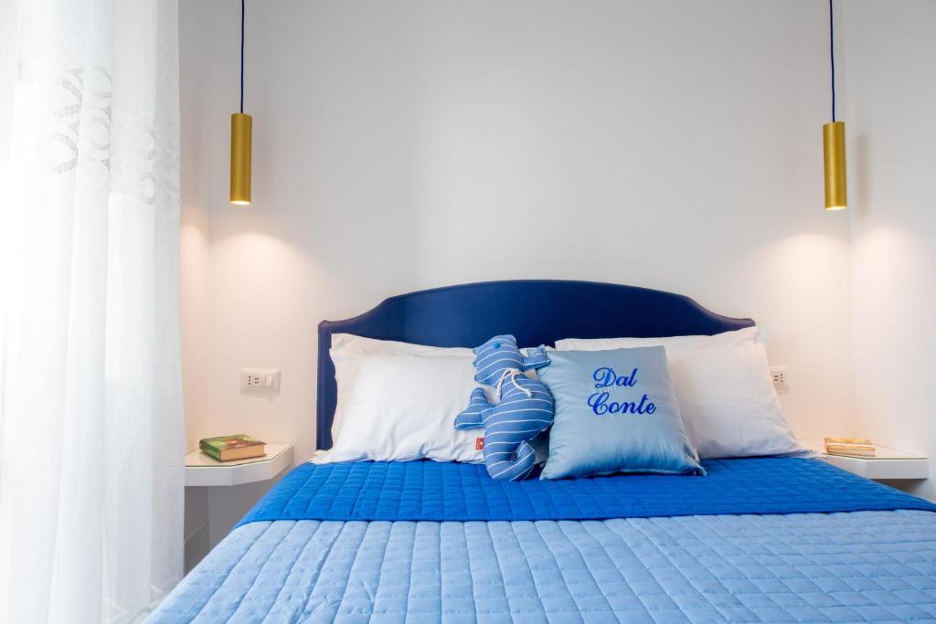 Postel nebo postele na pokoji v ubytování Dal Conte Guest House