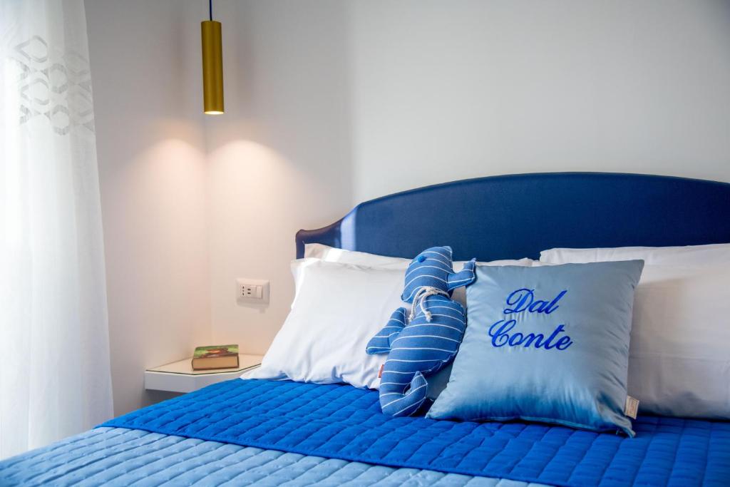 Postel nebo postele na pokoji v ubytování Dal Conte Guest House