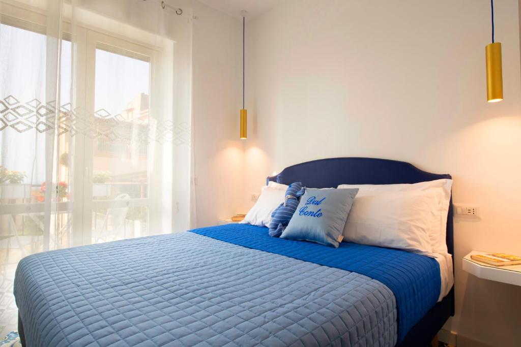 Postel nebo postele na pokoji v ubytování Dal Conte Guest House