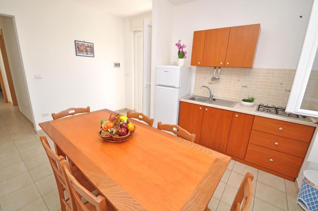 Kuchyň nebo kuchyňský kout v ubytování Residence Punta Pizzo