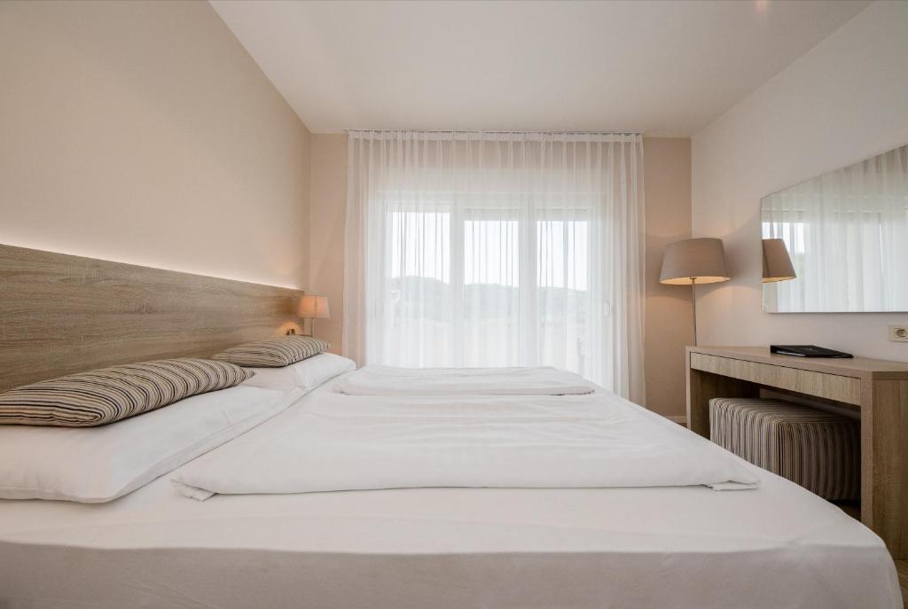 Postel nebo postele na pokoji v ubytování B&B Vila Sabbia