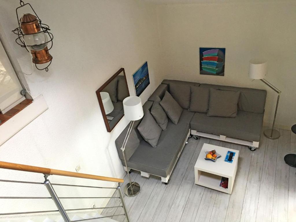 an overhead view of a living room with a couch and a table at Holiday Home Les maisons de la forêt by Interhome in Lacanau-Océan