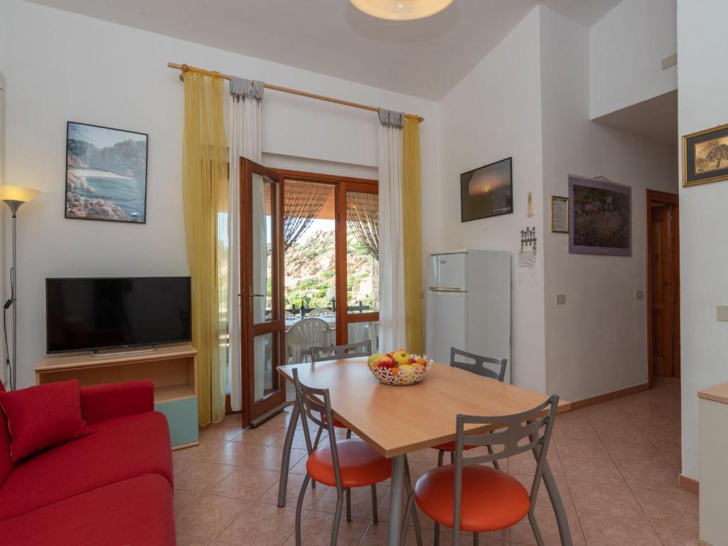Televízia a/alebo spoločenská miestnosť v ubytovaní Villa Gatti by Interhome