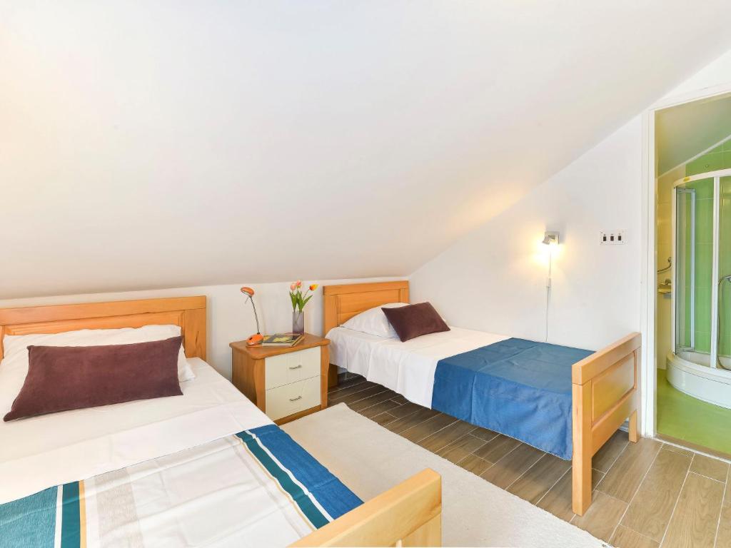 Postel nebo postele na pokoji v ubytování Apartment Valentina-1 by Interhome