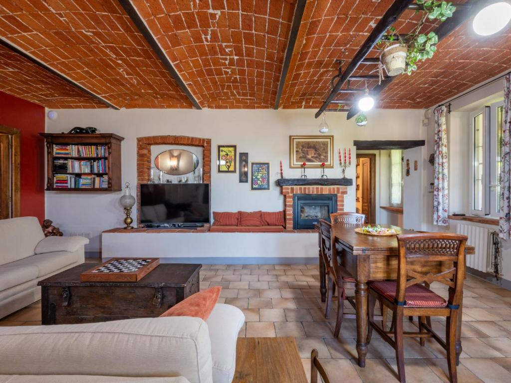 A seating area at Holiday Home Marmorito by Interhome