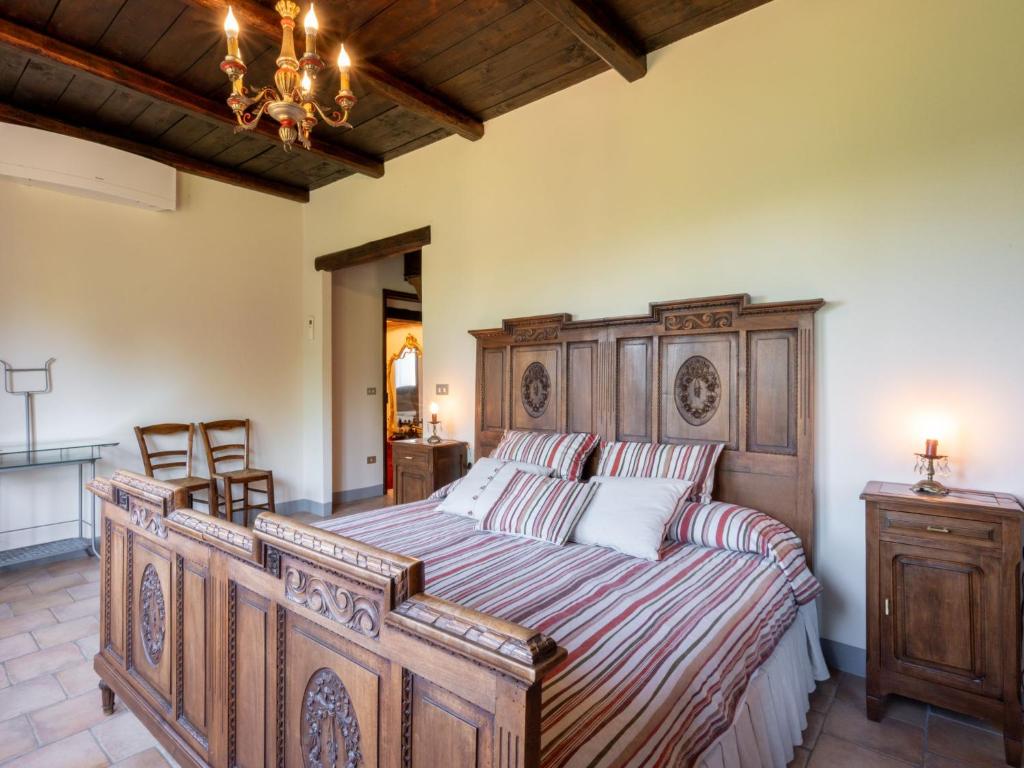 A bed or beds in a room at Holiday Home Marmorito by Interhome