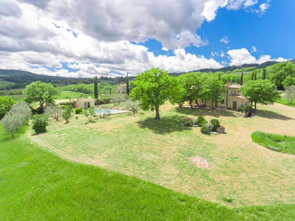 an overhead view of a yard with trees and a house at Villa Casa Frati by Interhome in Castiglione dʼOrcia