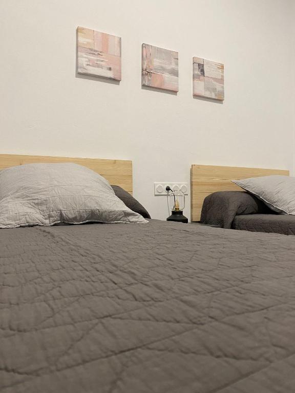 Postel nebo postele na pokoji v ubytování Jerez Hostel