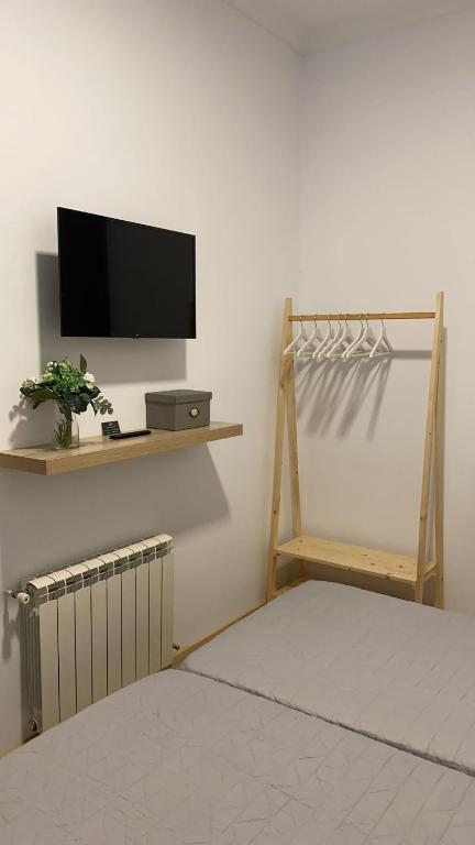 TV a/nebo společenská místnost v ubytování Jerez Hostel