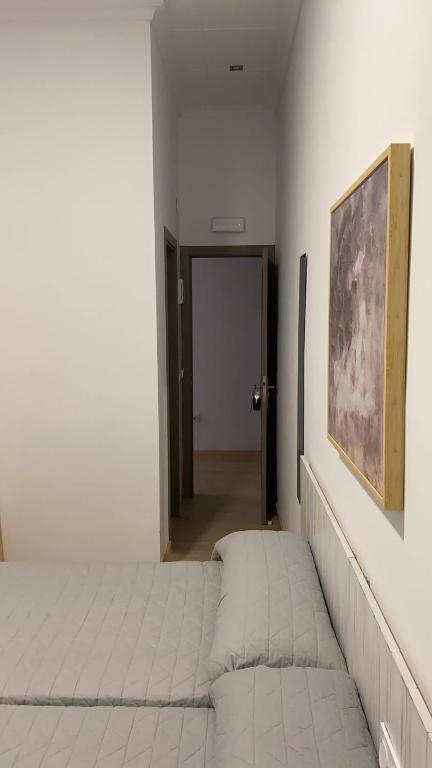 Postel nebo postele na pokoji v ubytování Jerez Hostel