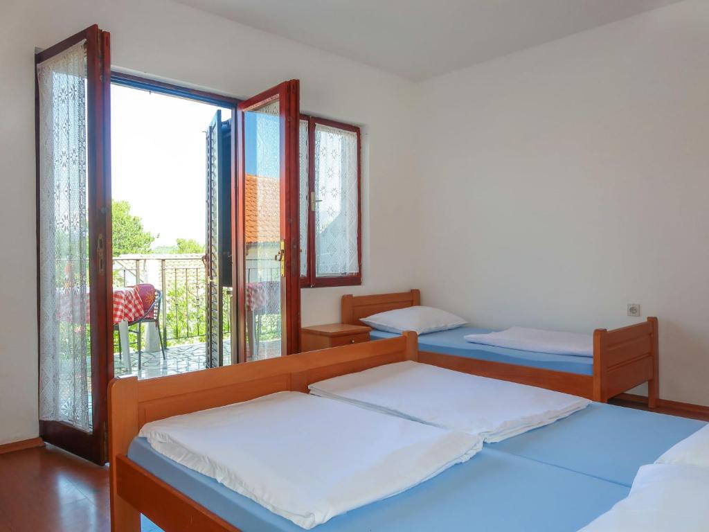 Posteľ alebo postele v izbe v ubytovaní Holiday Home Maravic-2 by Interhome