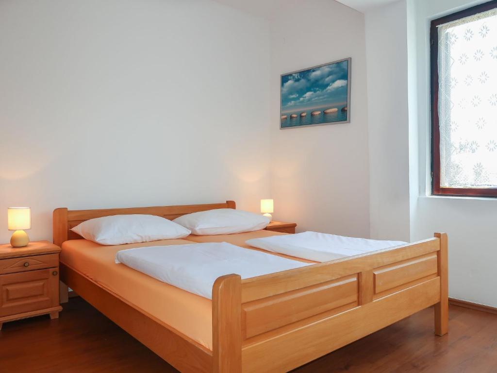 Łóżko lub łóżka w pokoju w obiekcie Holiday Home Maravic-1 by Interhome