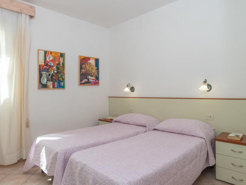 Posteľ alebo postele v izbe v ubytovaní Apartment Mari by Interhome