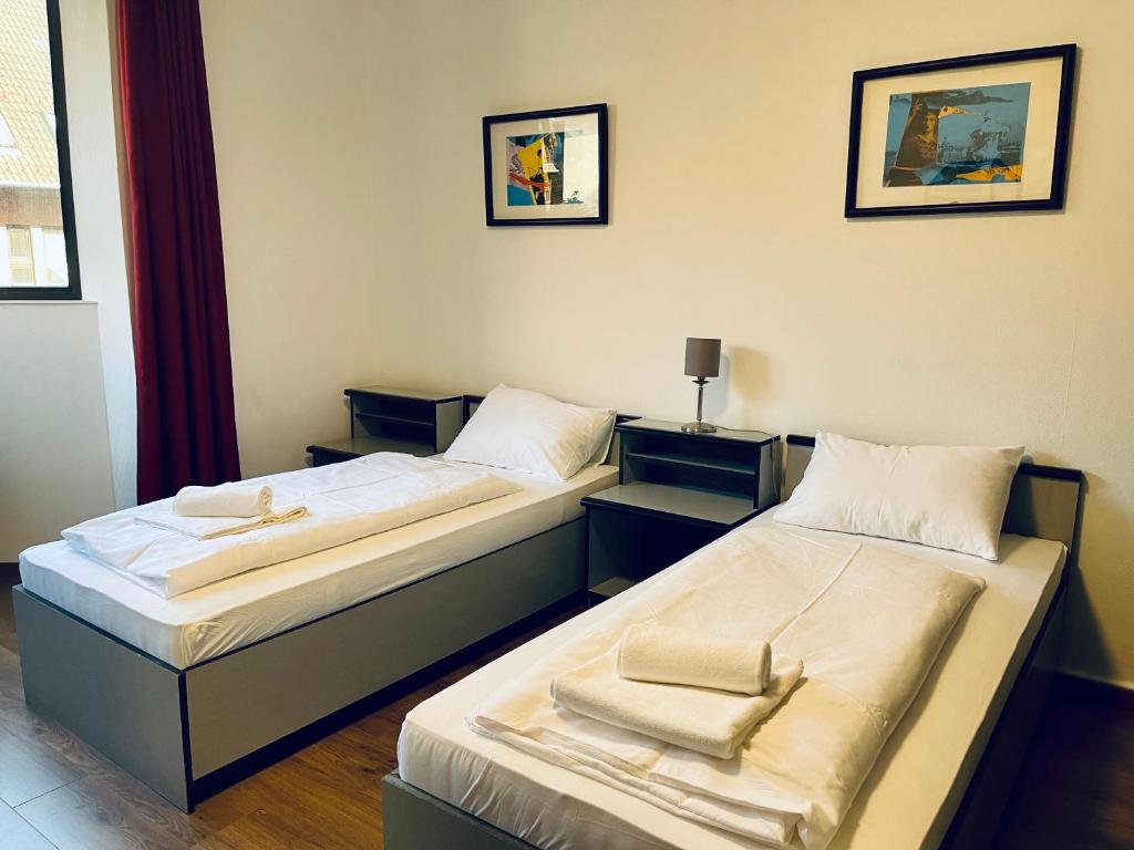 Posteľ alebo postele v izbe v ubytovaní Thomas Hotel Budapest