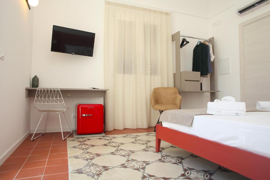 Postel nebo postele na pokoji v ubytování Casa Maja rooms & suites