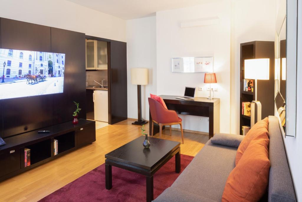 TV o dispositivi per l'intrattenimento presso The Levante Rathaus Apartments