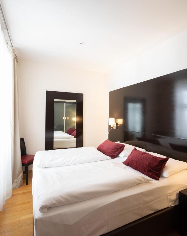 Letto o letti in una camera di The Levante Rathaus Apartments