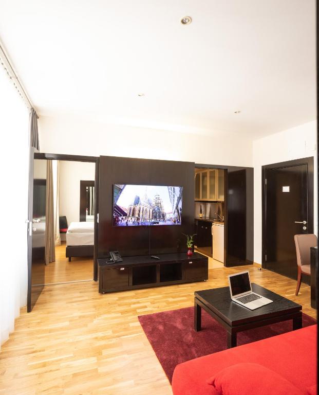 TV o dispositivi per l'intrattenimento presso The Levante Rathaus Apartments