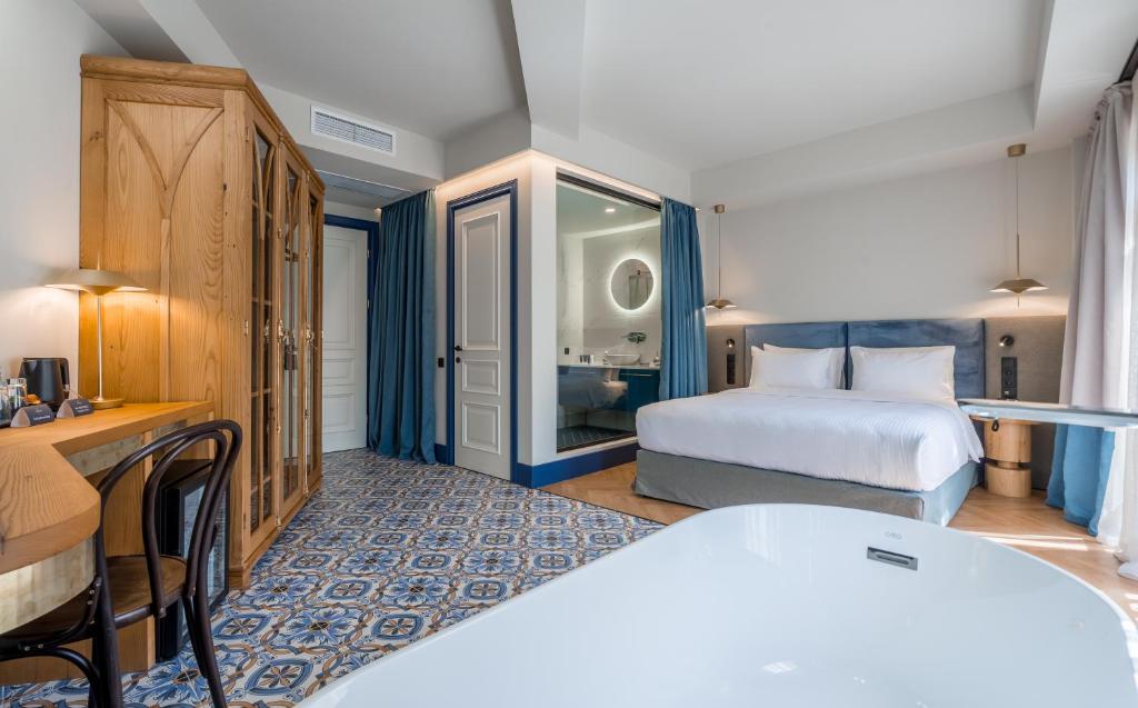 Postel nebo postele na pokoji v ubytování Abanotubani Boutique hotel
