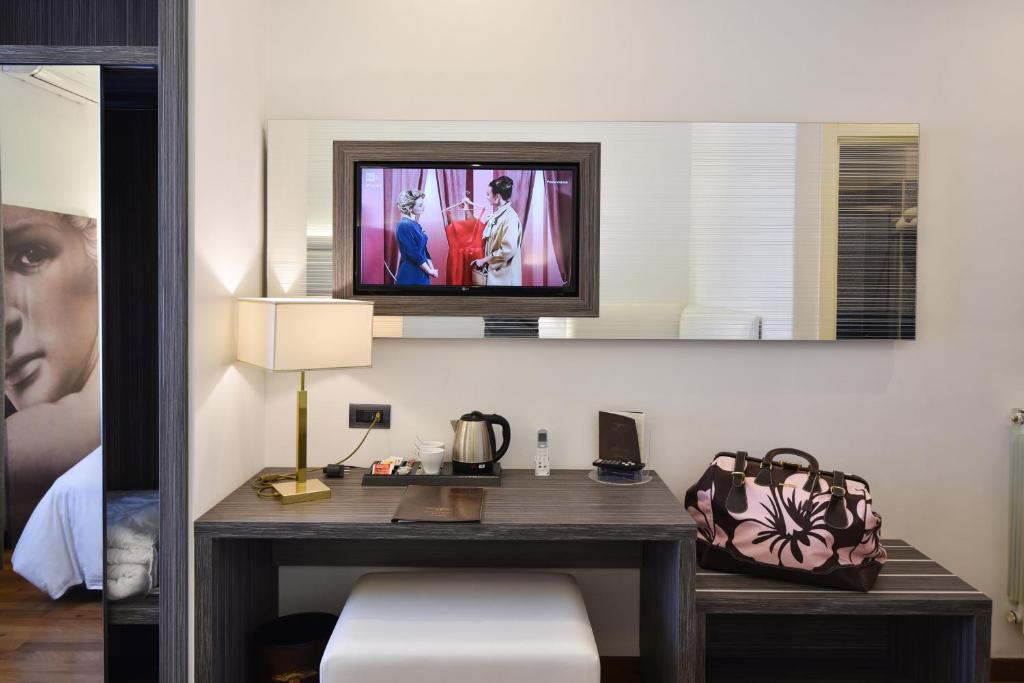 TV a/nebo společenská místnost v ubytování Hotel Palma