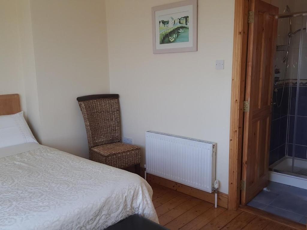 Postel nebo postele na pokoji v ubytování Seashells B&B