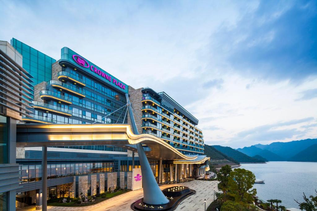 a hotel with a view of a body of water at Crowne Plaza Hangzhou Thousand Island Lake, an IHG Hotel in Thousand Island Lake