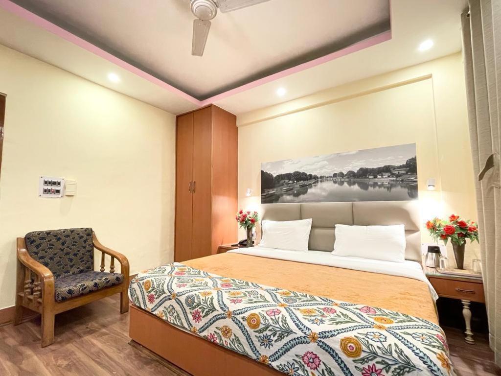 Postel nebo postele na pokoji v ubytování Hotel Centre Point
