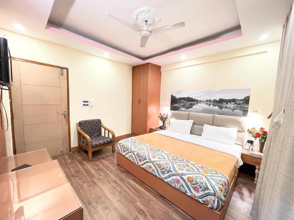 Postel nebo postele na pokoji v ubytování Hotel Centre Point
