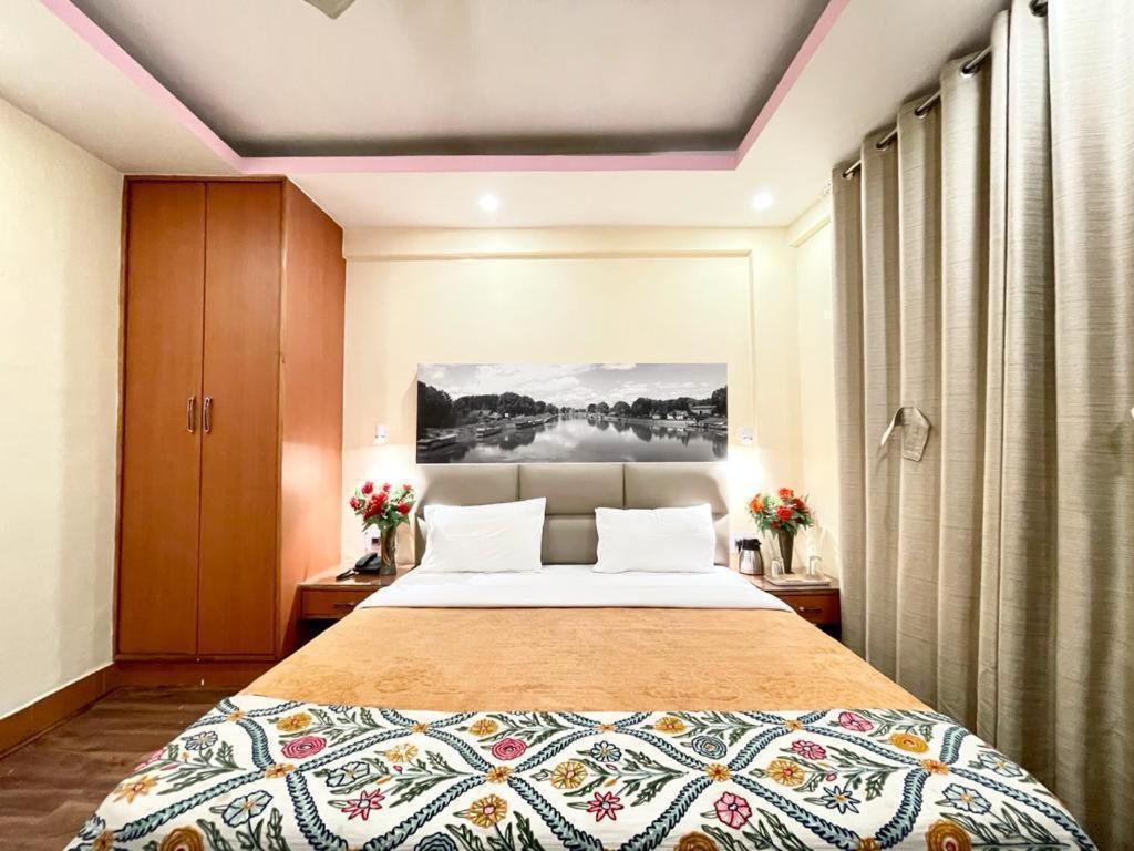 Postel nebo postele na pokoji v ubytování Hotel Centre Point